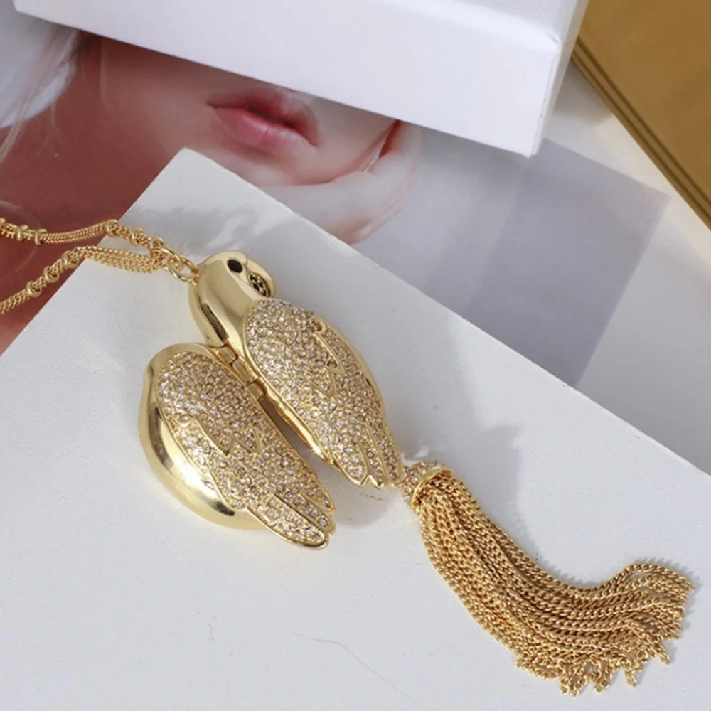 NWT Kate Spade Gold Toned Parrot Tassel Necklace - Picture 4 of 7